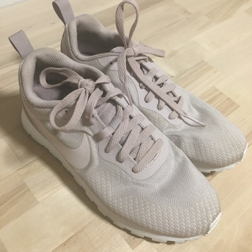 Blush Nike sneakers